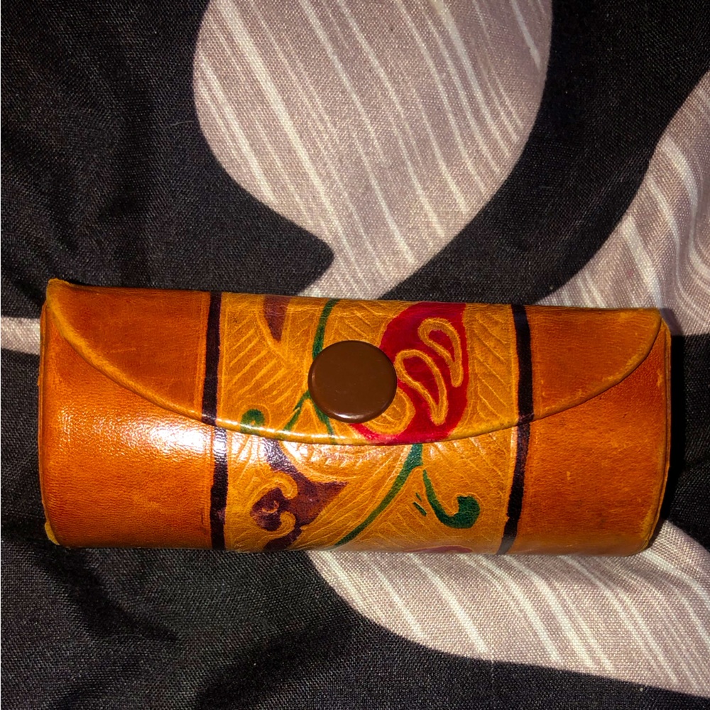 Leather lipstick case.